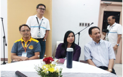 <p><strong>INNOVATION</strong>. Dr. Carlos C. Baylon (seated right) expounds on the Pinoy Longline innovation on growing mussels at the media forum panel with Dr. Nathaniel C. Bantayan (seated left) and Dr. Mary Beth B. Maningas (center), an event under the auspices of the Philippine Council for Agriculture, Aquatic and Natural Resources Research and Development of the Department of Science and Technology (DOST) at its compound in Los Banos, Laguna on March 26, 2018. <em>(Photo by Zen Trinidad/PNA)</em></p>